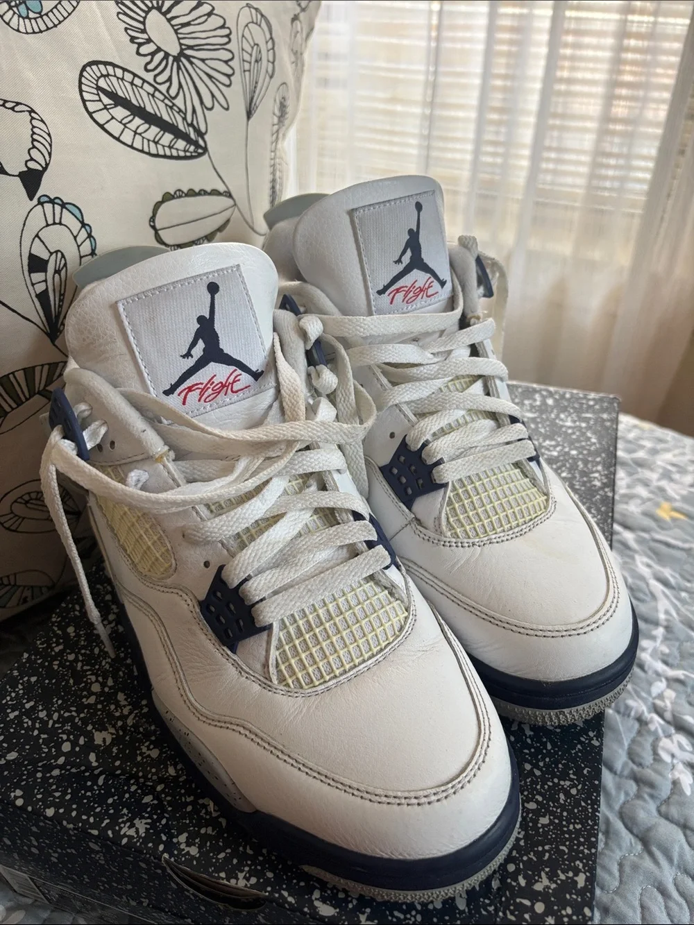 Nike White and Navy Air Jordan 4 Retro Sneakers